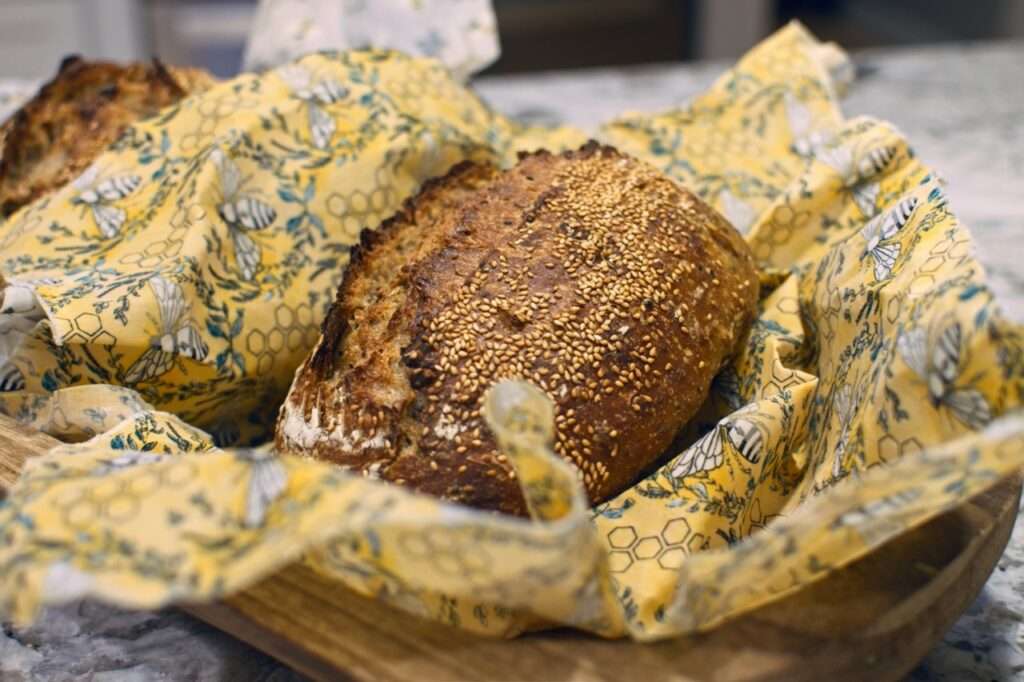 homemade sourdough bread loaf wrapped in a DIY beeswax wrap